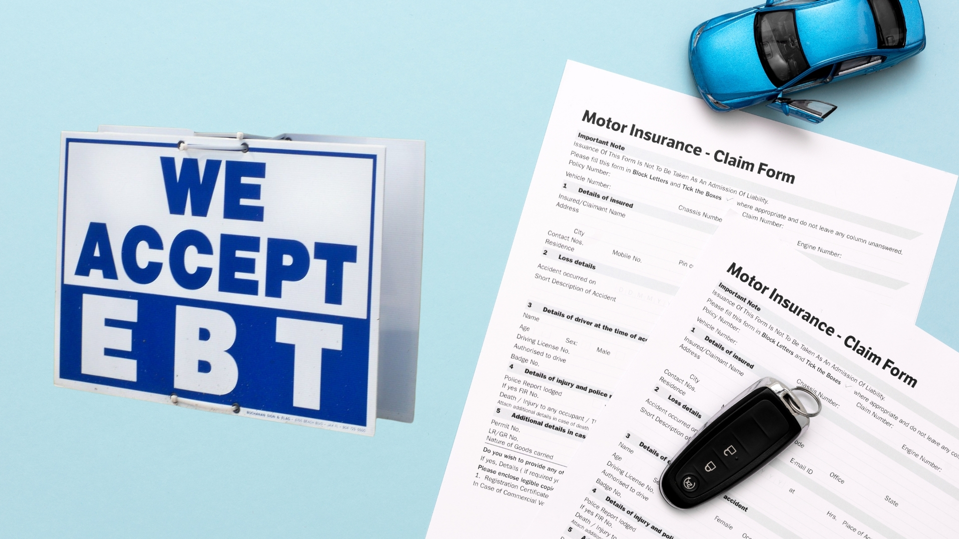 Visual showing EBT car insurance with an EBT sign, claim forms, car key, and toy car on a blue background