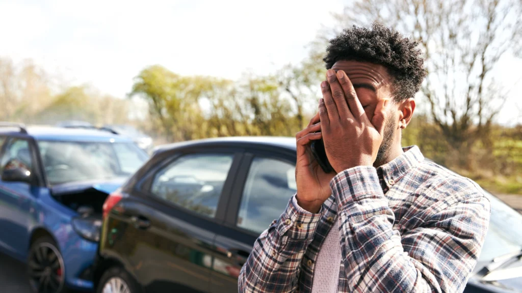 Upset driver on phone after crash if someone rear ends you whose insurance do you call to report damage and start a claim?