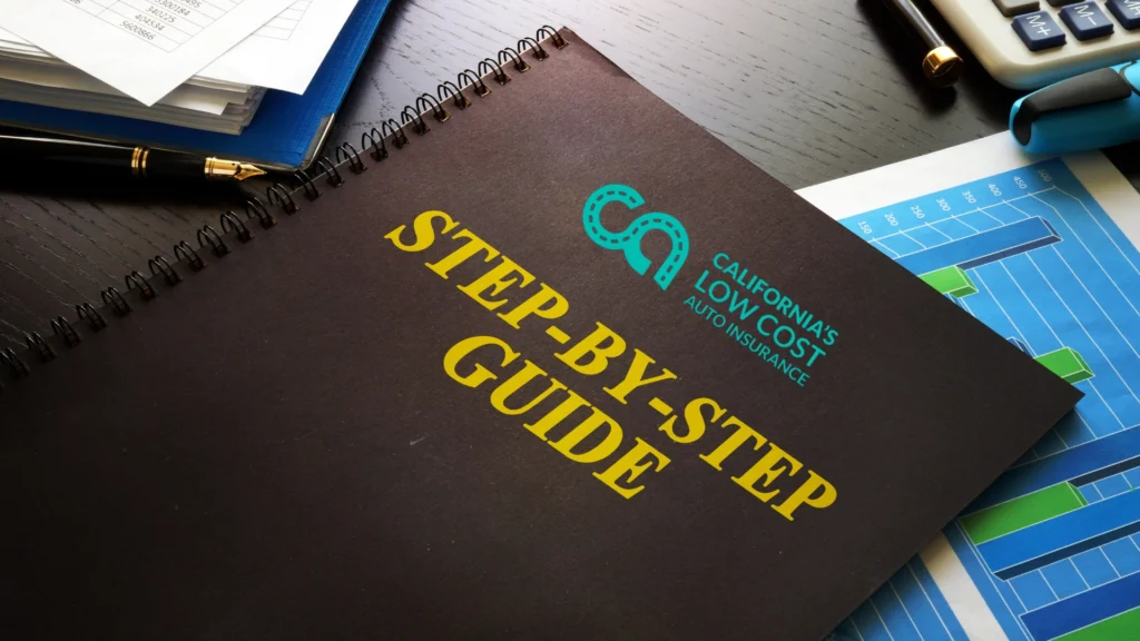 California Low Cost Auto Insurance Program step-by-step guidebook on a desk with charts, papers, and a calculator.