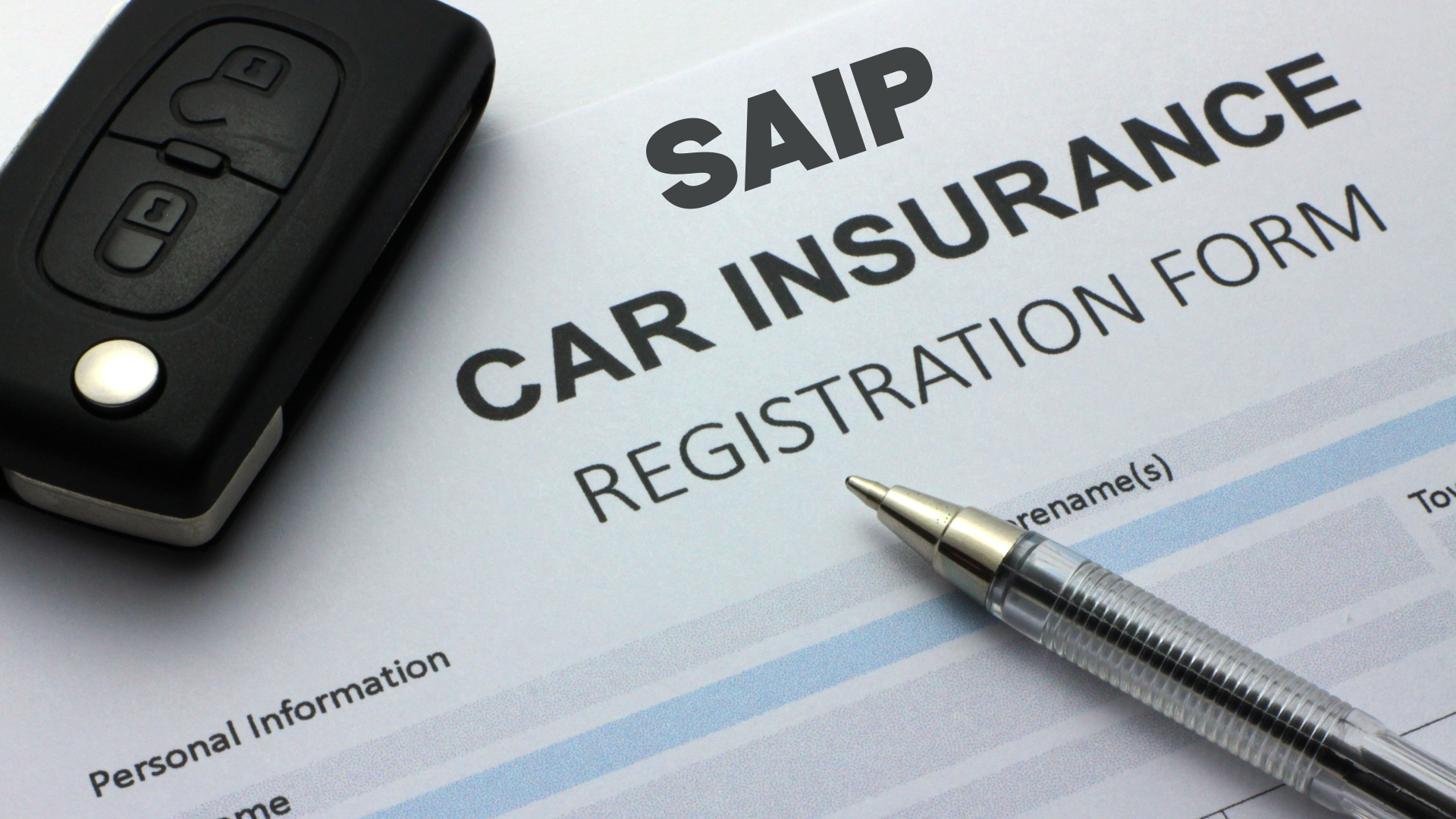 SAIP program auto insurance registration document with key and pen.